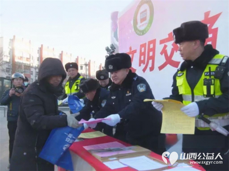 阳光下的守护----浑源县启动第十四个122全国交通安全日主题宣传活动浑源县残联扶残助残志愿者协会参加了活动 - 第5张