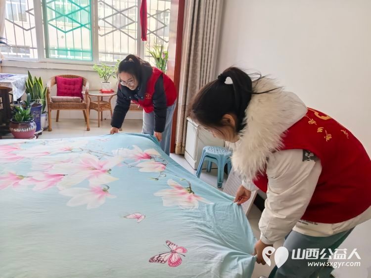 长治市武乡县丰州镇太东社区12·5国际志愿者日“志愿暖冬，爱满太东”系列活动为辖区特殊群体与户外劳动者送去冬日关怀 - 第9张