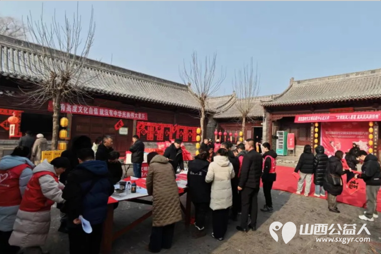 墨香粥暖迎新春·秀容志愿传温情----忻州市秀容志愿团队助力秀容书院博物馆新春文明实践活动以晒春联整春联的实干身影为年俗盛宴注入志愿力量 - 第7张