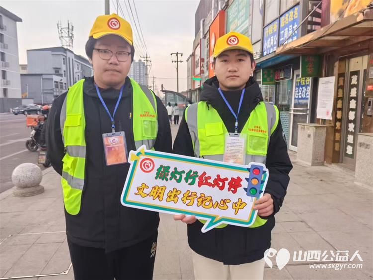 文水县爱心帮扶志愿者协会2月4日组织返乡学子赴文水街头守十字路口传文明理念引导市民规范出行遵守交通秩序 - 第3张