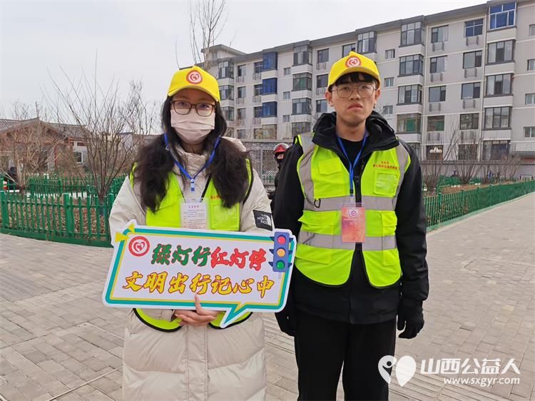 文水县爱心帮扶志愿者协会组织的返乡志愿者2月5日继续赴文水街头守十字路口传文明理念引导市民规范出行遵守交通秩序 - 第4张 - 山西公益人 文水县爱心帮扶志愿者协会组织的返乡志愿者2月5日继续赴文水街头守十字路口传文明理念引导市民规范出行遵守交通秩序 - 第4张
