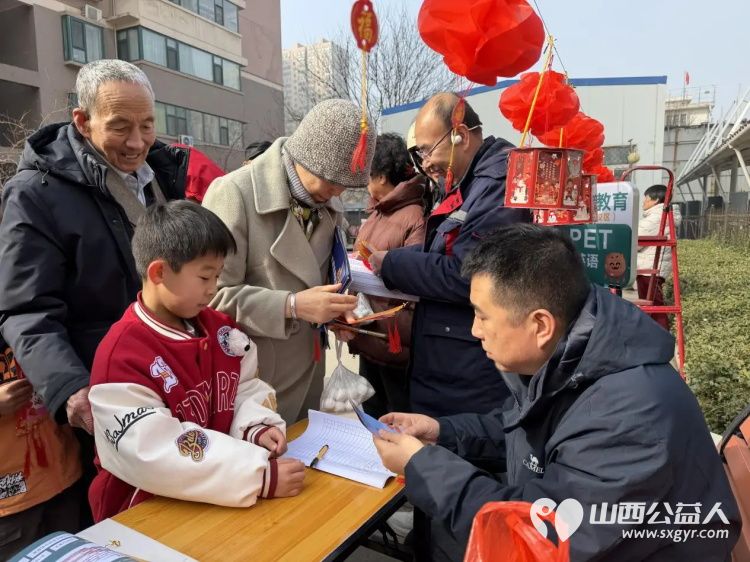 浓情元宵便民同行----太原市文华苑社区元宵节系列活动文艺演出趣味灯谜闹元宵开展三代社保卡现场免费升级服务 - 第4张