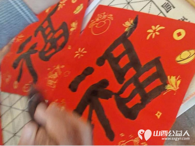 太原市儿童友好促进会组织志愿服务活动联合怡静阁书法、盛大齿科为社区长者送去春节祝福 - 第7张