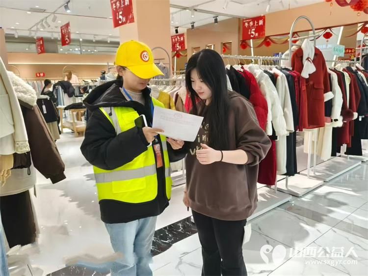 平安过马年志愿护文水----2月14日文水县爱心帮扶志愿者协会组织志愿者走上街头走进商场店铺开展筑牢烟花爆竹安全防线宣传活动 - 第5张