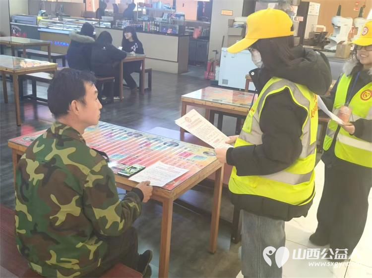 平安过马年志愿护文水----2月14日文水县爱心帮扶志愿者协会组织志愿者走上街头走进商场店铺开展筑牢烟花爆竹安全防线宣传活动 - 第2张