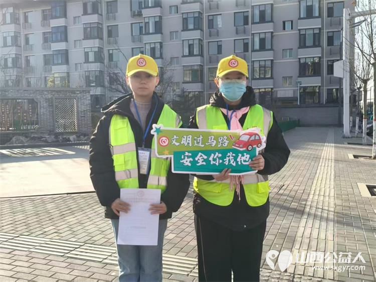 文水县爱心帮扶志愿者协会的返乡学子2月14日赴文水街头传文明理念引导市民规范出行遵守交通秩序以青春之力筑安全防线 - 第5张