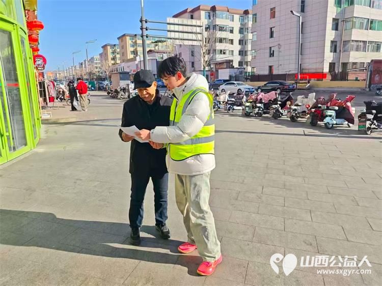 文水县爱心帮扶志愿者2月19日走进大街小巷让市民在指定区域安全燃放烟花爆竹遵守禁放限放规定文明过节平安过年 - 第9张
