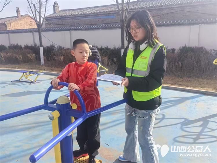 文水县爱心帮扶志愿者协会的志愿者们2月20日继续坚守一线面对面劝导引导等方式向过往市民普及烟花爆竹禁限放规定 - 第5张