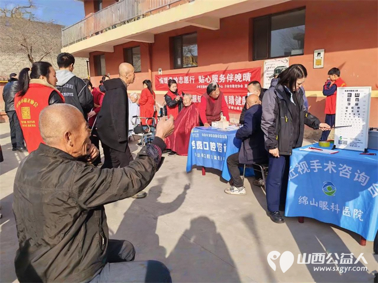 介休市敬老协会敬老爱老助老活动2026年3月21日组织志愿者走进连福镇张良村为老人免费理发体检 - 第1张