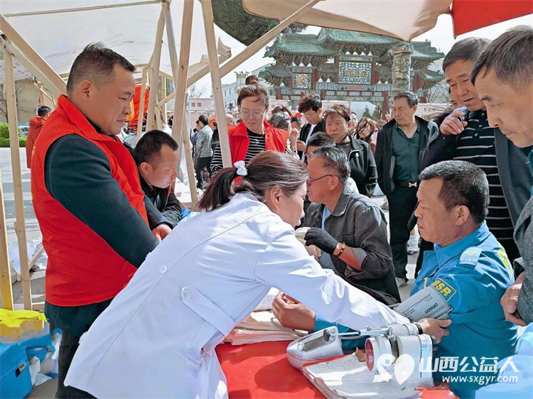 传承非遗品味文化----介休市敬老协会4月3日参加了非遗文化传承活动在后土庙为所有老人爱心理发义诊为老人们晚年生活送去一份温暖 - 第7张