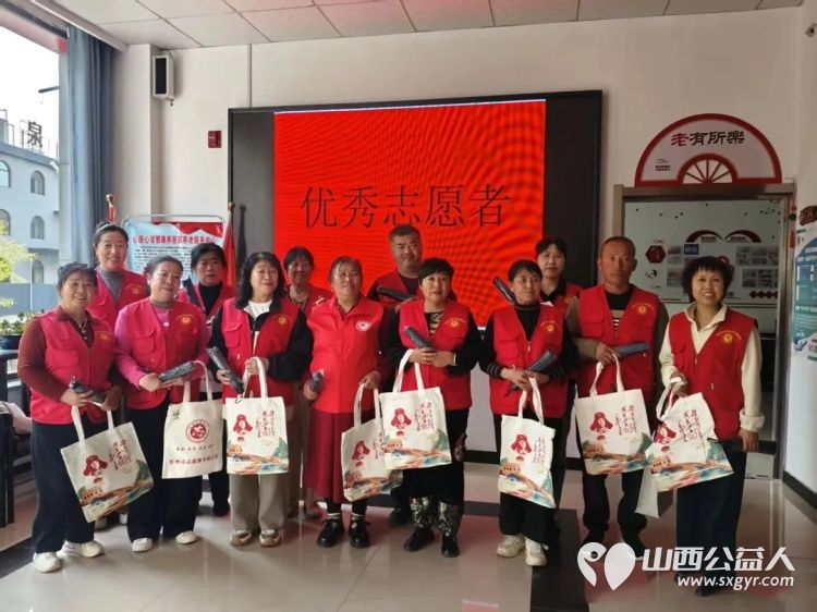 最是书香能致远志愿同行润心田----忻州市心连心志愿服务队开展世界读书日志愿活动给团队的优秀志愿者送上书籍雨伞和实用手提袋 - 第3张