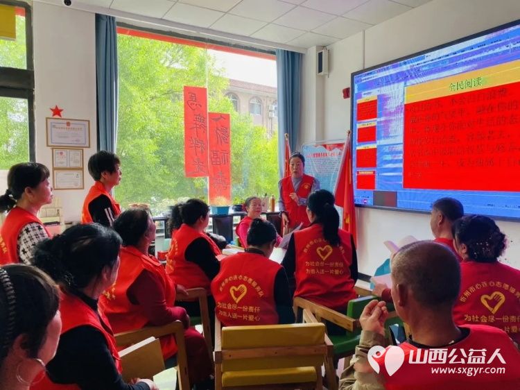 最是书香能致远志愿同行润心田----忻州市心连心志愿服务队开展世界读书日志愿活动给团队的优秀志愿者送上书籍雨伞和实用手提袋 - 第5张