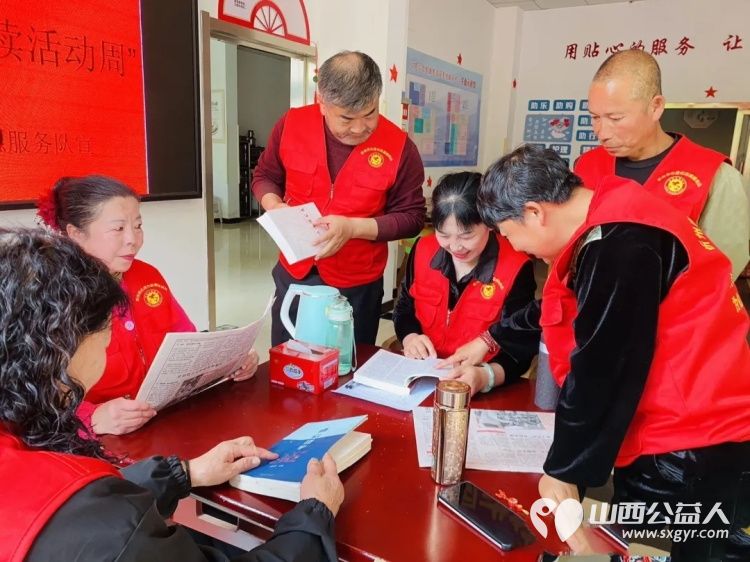 最是书香能致远志愿同行润心田----忻州市心连心志愿服务队开展世界读书日志愿活动给团队的优秀志愿者送上书籍雨伞和实用手提袋 - 第4张