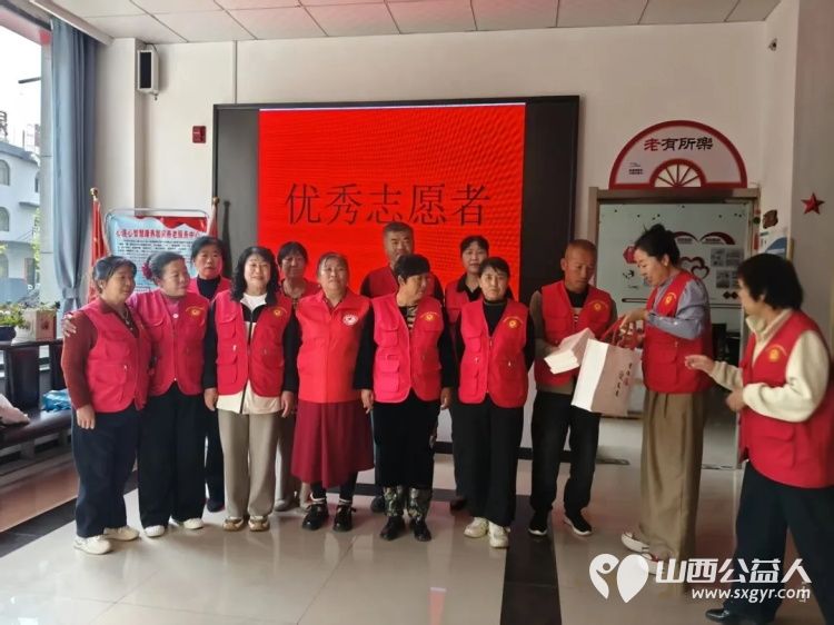 最是书香能致远志愿同行润心田----忻州市心连心志愿服务队开展世界读书日志愿活动给团队的优秀志愿者送上书籍雨伞和实用手提袋 - 第2张