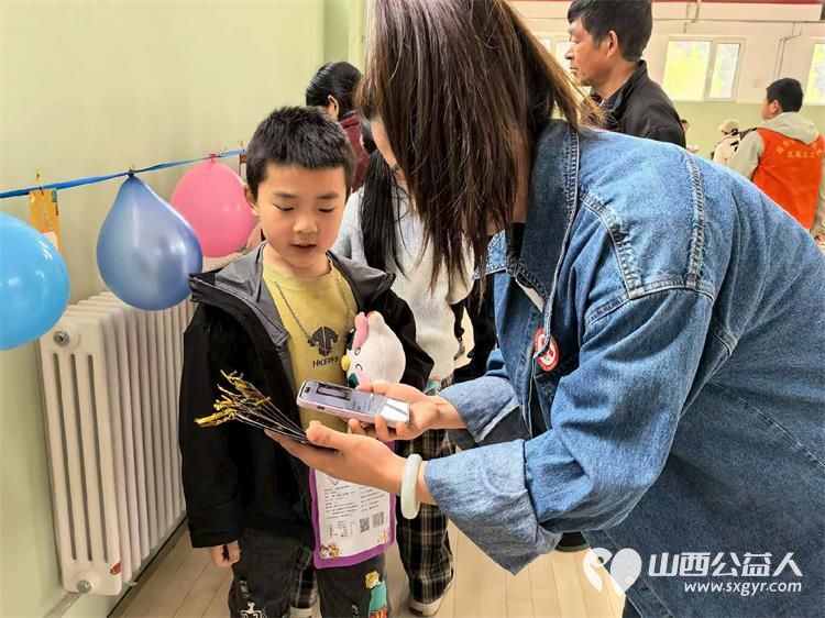 太原市龙城义工世界读书日主题活动在五台山石咀小学举办校园文化集市为孩子们捐赠图书 - 第9张