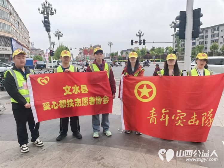 坚守岗位护秩序暖心服务显担当----文水县爱心帮扶志愿者协会在文水东门开展专项秩序维持志愿活动用实际行动践行志愿服务精神守护城市文明秩序 - 第2张