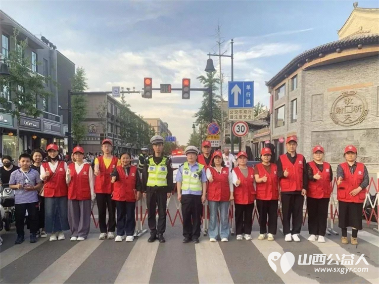 助力文旅盛会守护文明出行----临汾市文明交通志愿者协会在五天假期里共出动志愿者160名总服务时长达1074小时全力保障活动期间道路安全畅通秩序井然 - 第1张