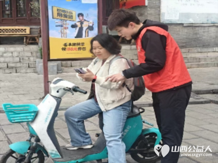 介休市北关街道彦博路社区志愿者协会在介休市三贤大道博物馆门口圆满开展公益引导志愿服务活动以志愿之力守护文旅秩序彰显城市文明 - 第10张