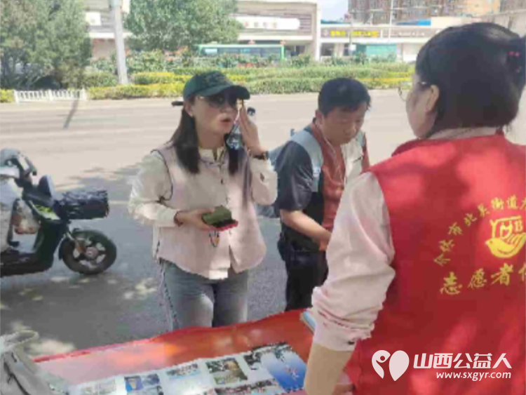 介休市北关街道彦博路社区志愿者协会在介休市三贤大道博物馆门口圆满开展公益引导志愿服务活动以志愿之力守护文旅秩序彰显城市文明 - 第8张