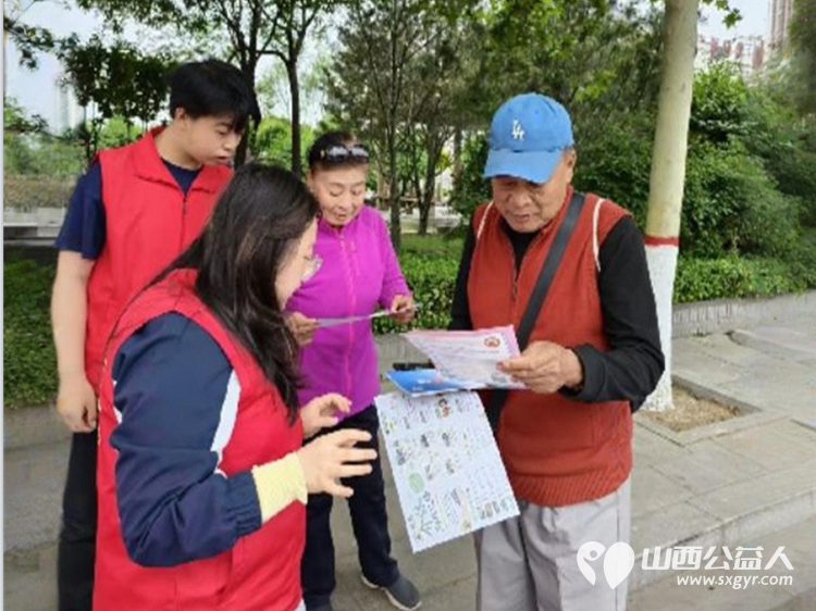 介休市北关街道彦博路社区志愿者协会在介休市三贤大道博物馆门口圆满开展公益引导志愿服务活动以志愿之力守护文旅秩序彰显城市文明 - 第2张