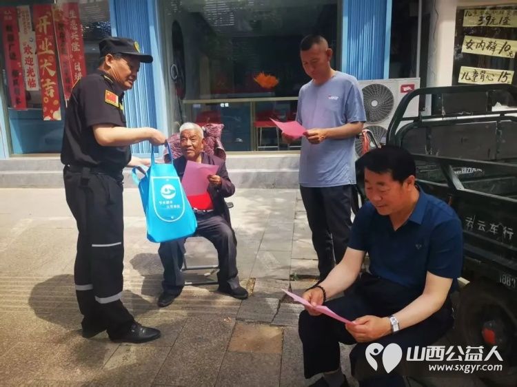 节水护水进基层环保志愿暖定襄----忻州市环保志愿者协会协同定襄县水利局走进定襄县城市公园休闲场所面向普通市民开展城市节水宣传周主题活动 - 第6张