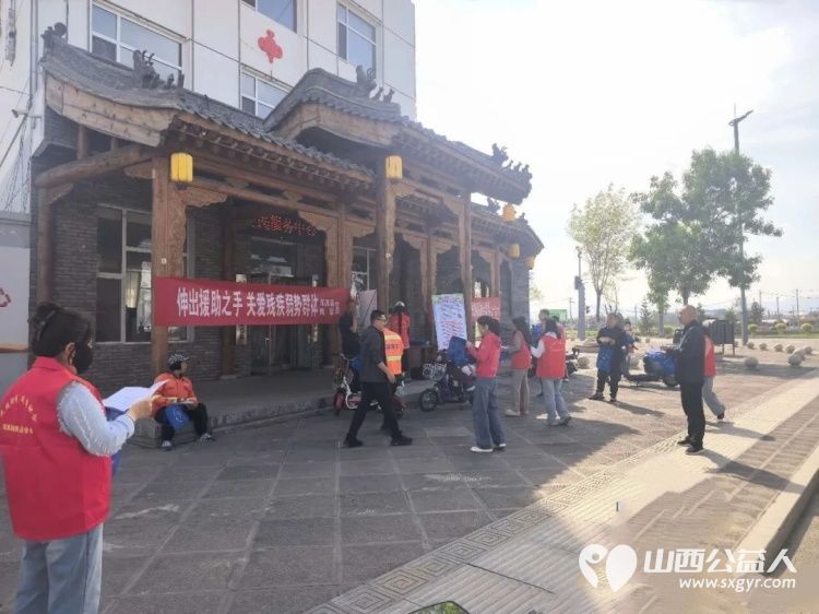保障残疾人平等权益促进残疾人融合发展----浑源县残联开展第三十六个全国助残日系列活动发放无纺布宣传袋500余个宣传书籍1500余册现场接受咨询群众达300余人次 - 第5张