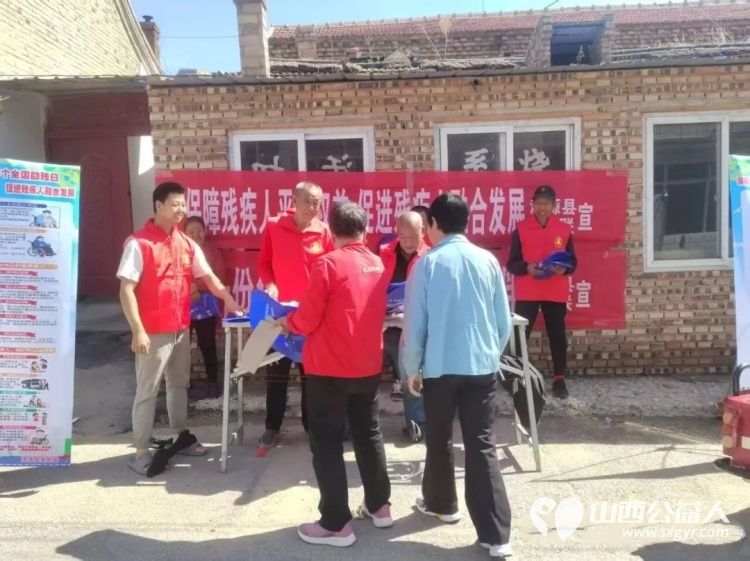 保障残疾人平等权益促进残疾人融合发展----浑源县残联开展第三十六个全国助残日系列活动发放无纺布宣传袋500余个宣传书籍1500余册现场接受咨询群众达300余人次 - 第6张