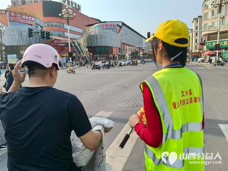 文明劝导暖街头青春志愿护通行｜文水县爱心帮扶志愿者协会7月26日开展暑期交通文明活动向过往群众普及交通安全知识倡导大家自觉遵守交通法规 - 第10张