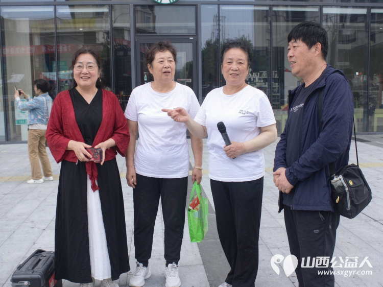 不忘初心跟党走携手争做排头兵----太原市广场舞协会组织500名健身爱好者齐聚太原市万柏林区吾悦广场开展了一场主题党日活动把全民健身的热乎气种进这片商圈的烟火里 - 第26张