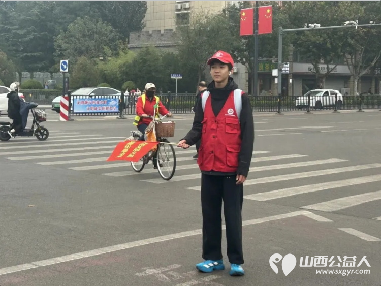 志愿护航马拉松温情守护文明路----临汾半程马拉松开跑临汾市文明交通志愿者协会组织志愿者配合交警开展交通保障志愿服务在鼓楼至水厂十字岗为赛事保驾护航 - 第11张 - 山西公益人 志愿护航马拉松温情守护文明路----临汾半程马拉松开跑临汾市文明交通志愿者协会组织志愿者配合交警开展交通保障志愿服务在鼓楼至水厂十字岗为赛事保驾护航 - 第11张