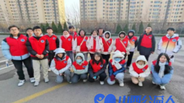 太原市小店区青年志愿者协会在大学城附近开展文明创城志愿活动