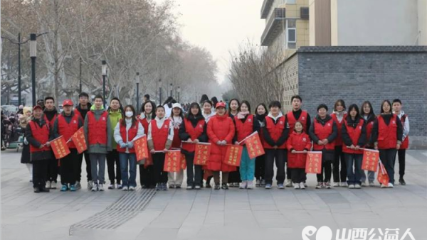 临汾市文明交通志愿者协会持续开展暖冬行动---爱临汾.赢未来文明交通劝导志愿服务活动