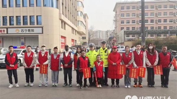 临汾市文明交通志愿者协会与临汾市公安交警支队直属一大队合作为广大考生提供交通安全保障