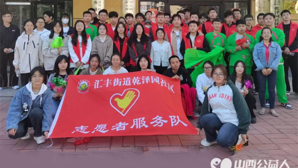 太原市汇丰街道乾泽园社区组织志愿者助力2024年太原马拉松比赛