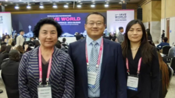 赞志愿者之星----王素娟女士参加世界第 27 届志愿者联合大会