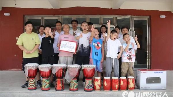 感谢山西万嘉人力资源有限公司微光成炬益暖童心的公益活动为太原灵星捐赠打印机非洲鼓和腰鼓等办公康复设施