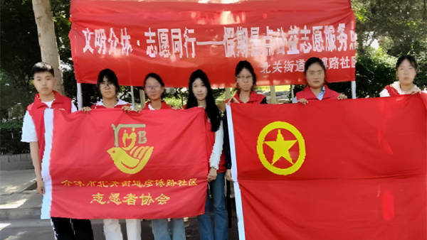 介休市北关街道彦博路社区志愿者协会在介休市三贤大道博物馆门口圆满开展公益引导志愿服务活动以志愿之力守护文旅秩序彰显城市文明